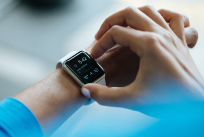 Person checking their smart watch